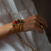 Bracelet doré tressé avec pierre semi-précieuse